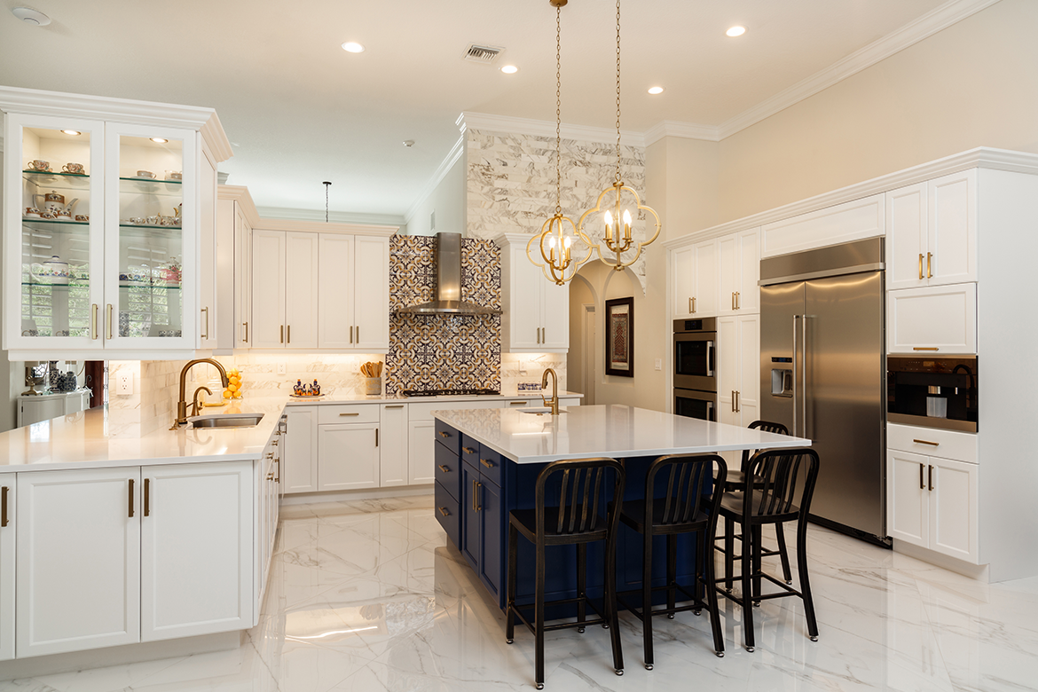 Luxury kitchen with navy and white color palette.